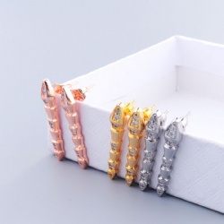 Serpentine earrings stud design with diamonds and zircons